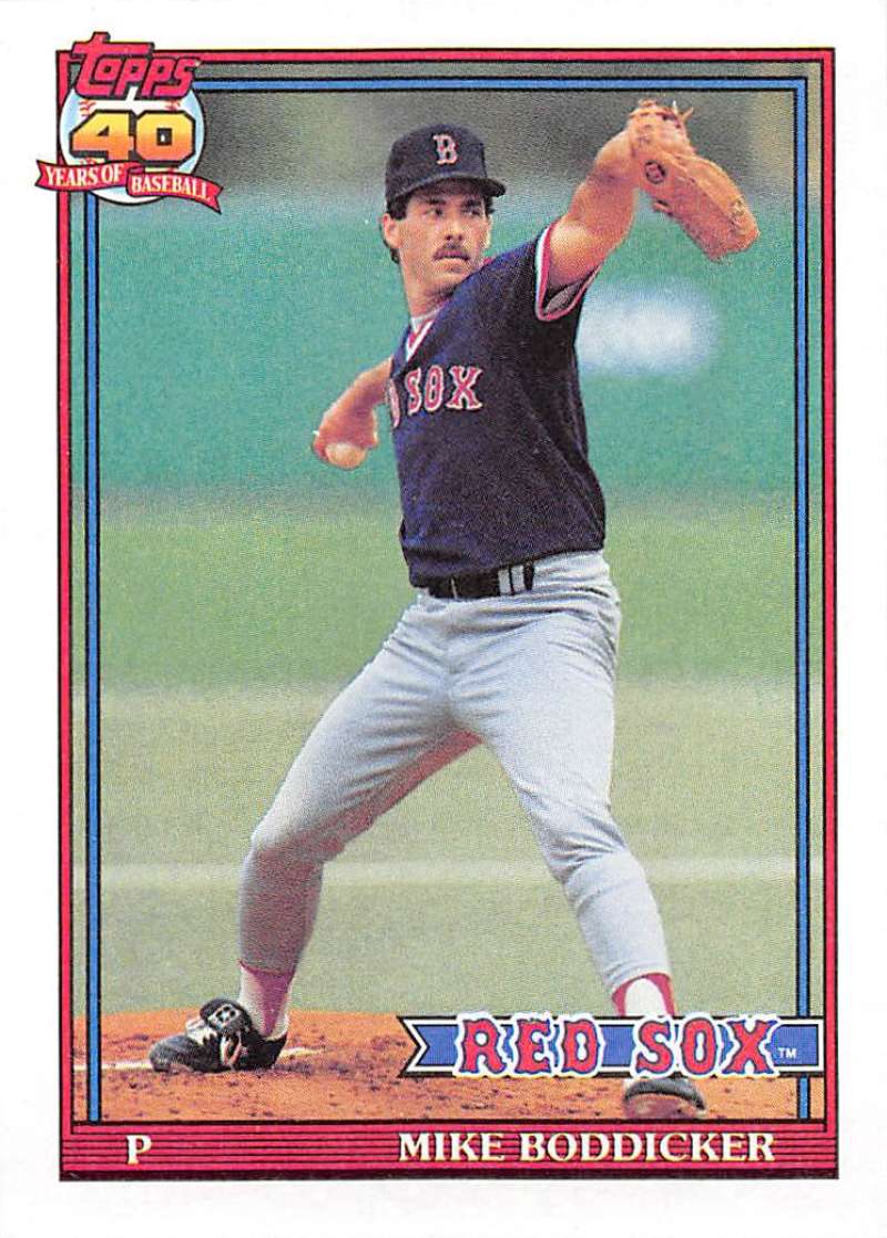 Baseball card of Mike Boddicker in mid-throw for Boston Red Sox navy uniform