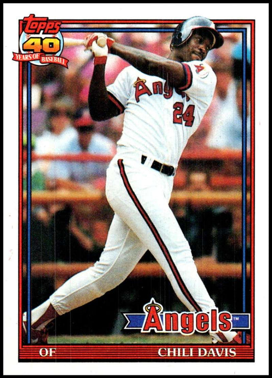 Baseball card of Chili Davis swinging bat in California Angels white uniform