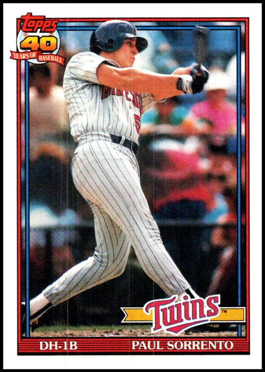 1991 Topps Paul Sorrento Minnesota Twins Baseball Card mid-swing in pinstripe uniform