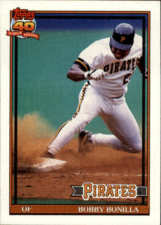 Bobby Bonilla sliding into base for the Pittsburgh Pirates, showcasing his athleticism