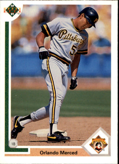 Orlando Merced in Pittsburgh Pirates uniform running on field for rookie card image