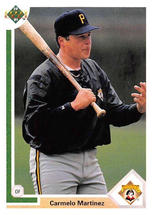 Carmelo Martinez in black uniform holding bat for Pittsburgh Pirates baseball card