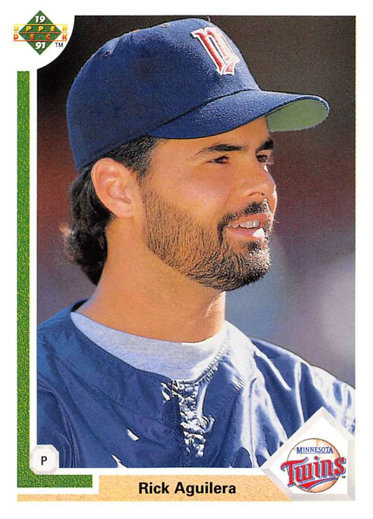 Rick Aguilera smiling in Minnesota Twins uniform on 1991 baseball card