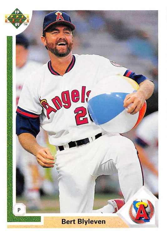 Bert Blyleven in California Angels uniform holding beach ball baseball card image