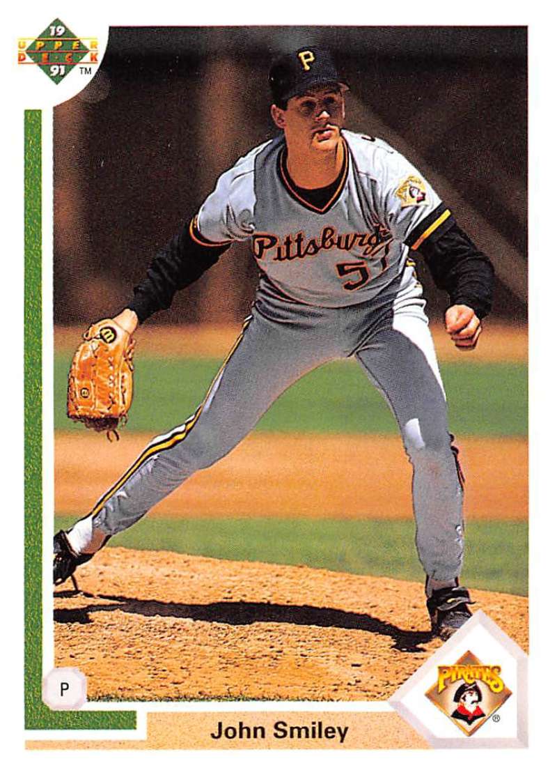 John Smiley of the Pittsburgh Pirates in a pitching motion on a baseball card