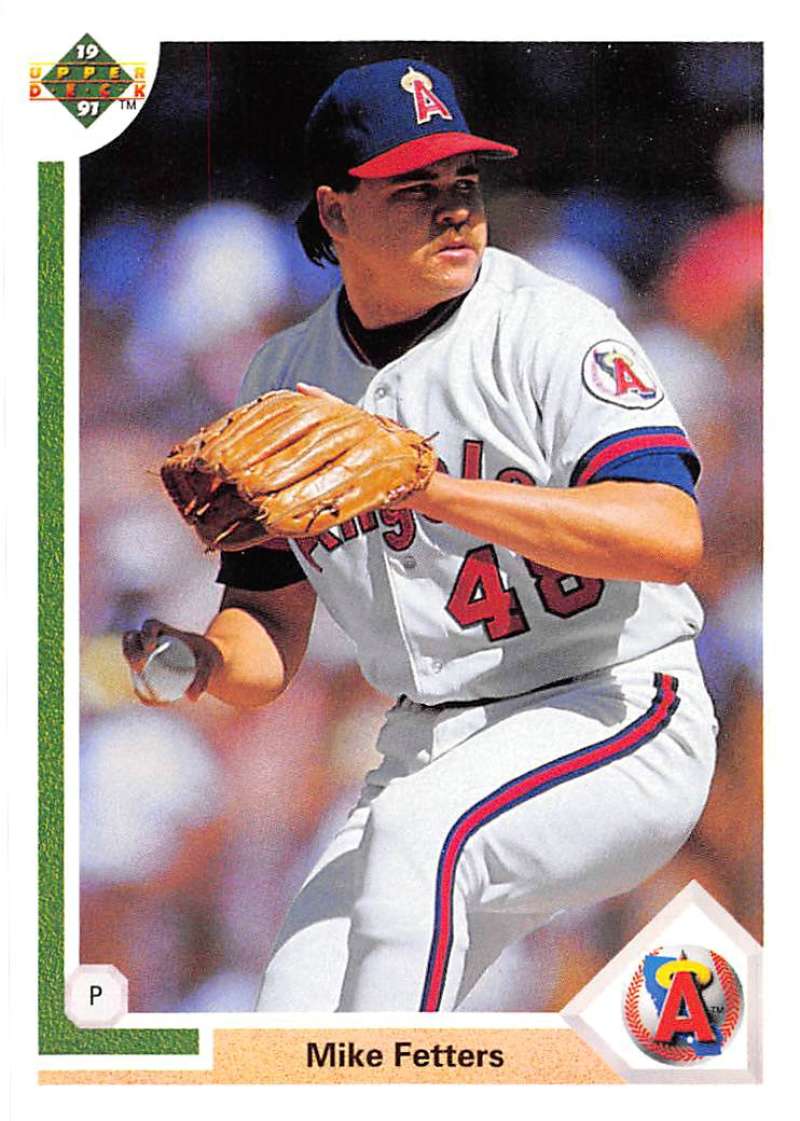 Baseball card of Mike Fetters, California Angels pitcher in white uniform and red cap