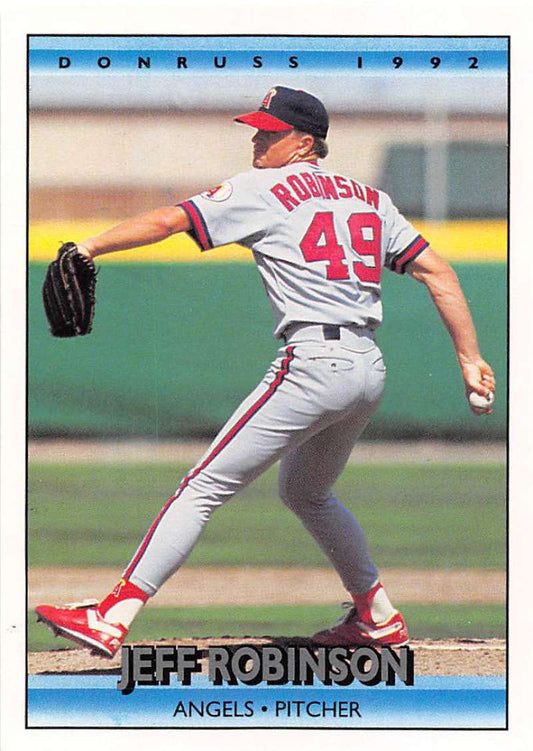 Baseball pitcher Jeff Robinson delivering in Angels uniform on 1992 Donruss baseball card