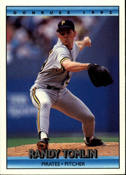 Randy Tomlin pitching for the Pittsburgh Pirates in a white uniform and black cap