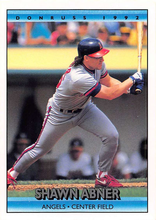 Shawn Abner in California Angels uniform preparing to bunt on baseball card