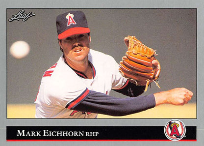 Baseball player Mark Eichhorn in California Angels uniform pitching with tan glove