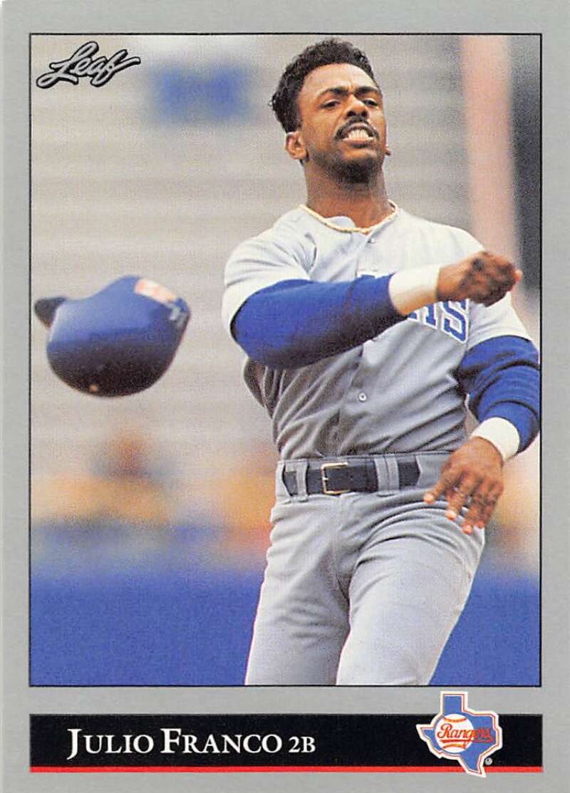 Julio Franco in gray uniform on 1992 Leaf Texas Rangers Baseball Card throwing helmet