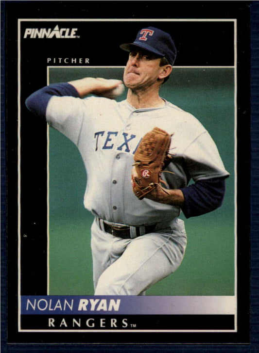 Texas Rangers baseball card of Nolan Ryan in mid-throwing motion wearing white uniform