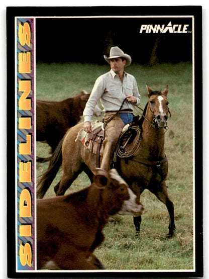 Cowboy herding cattle symbolizes the spirit of Nolan Ryan and the Texas Rangers baseball card