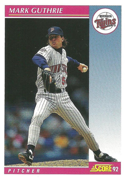 Minnesota Twins Mark Guthrie pitching in pinstriped uniform for baseball card collection