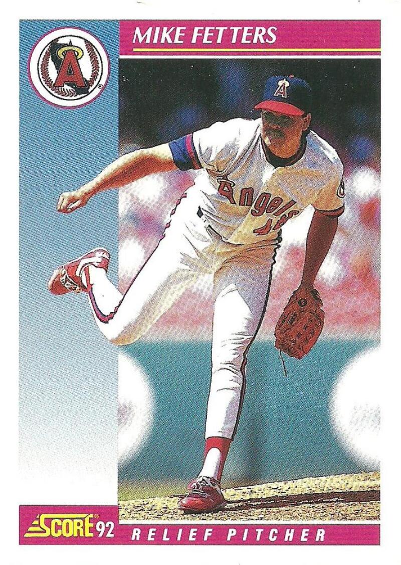 Baseball card of Mike Fetters in delivery for California Angels with white-red uniform