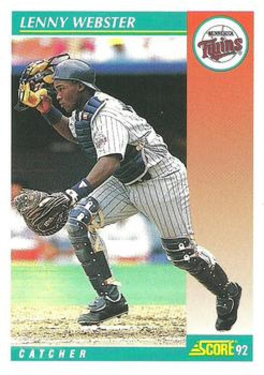 Baseball card of Lenny Webster making a play for the Minnesota Twins in pinstripes