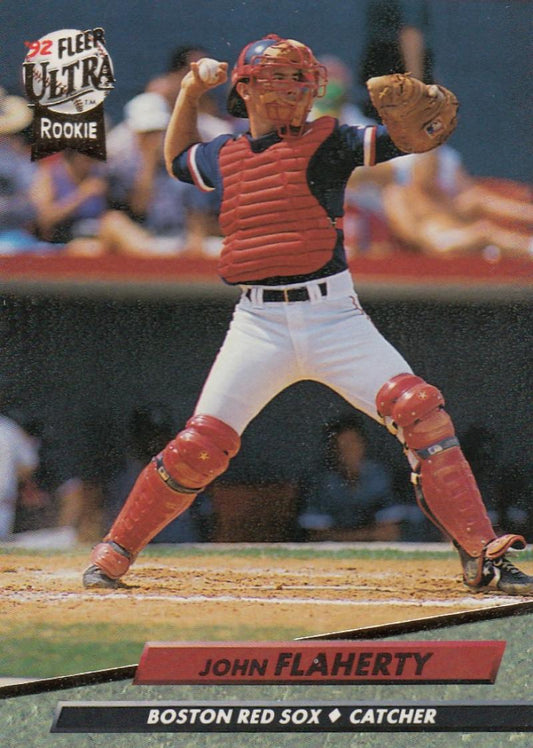 Baseball catcher in Red Sox uniform, John Flaherty, behind home plate action