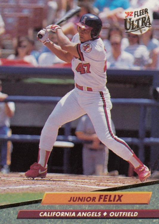 Baseball player in white California Angels uniform swinging bat for Fleer Ultra Junior Felix card