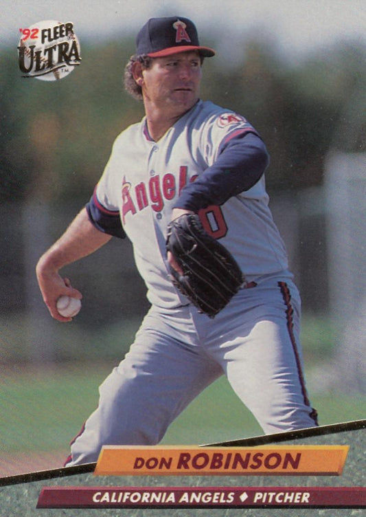 California Angels baseball card featuring Don Robinson mid-delivery in white uniform