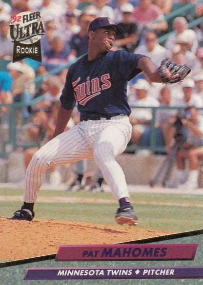 Pat Mahomes Minnesota Twins baseball card in navy uniform mid-delivery action shot