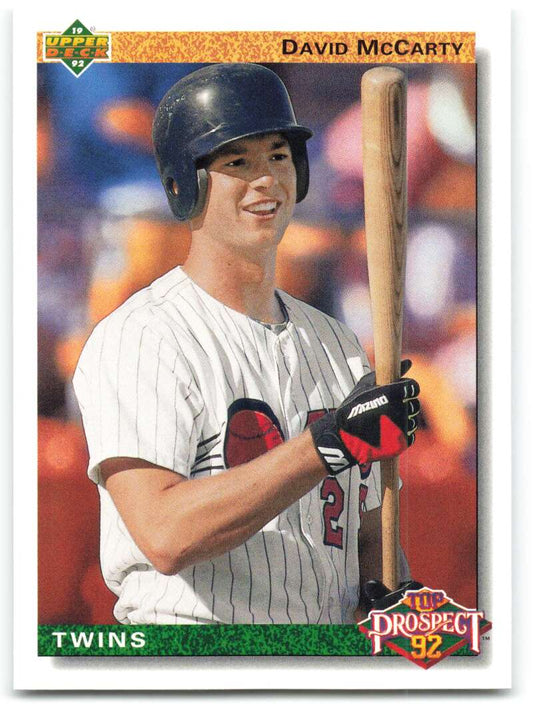 Baseball card of David McCarty in Minnesota Twins pinstriped uniform holding bat