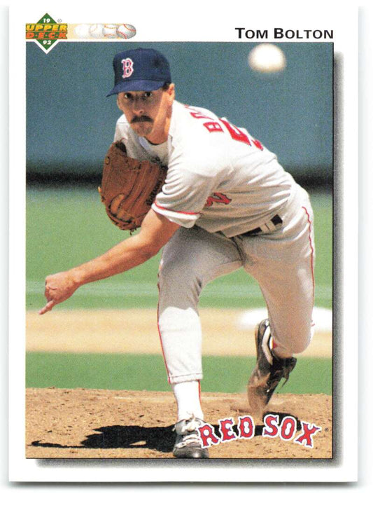 Baseball player Tom Bolton mid-pitch in Red Sox uniform on 1992 baseball card