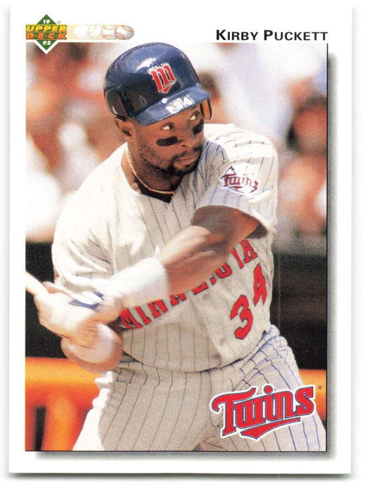 Kirby Puckett swinging bat in white pinstriped uniform Minnesota Twins Upper Deck card