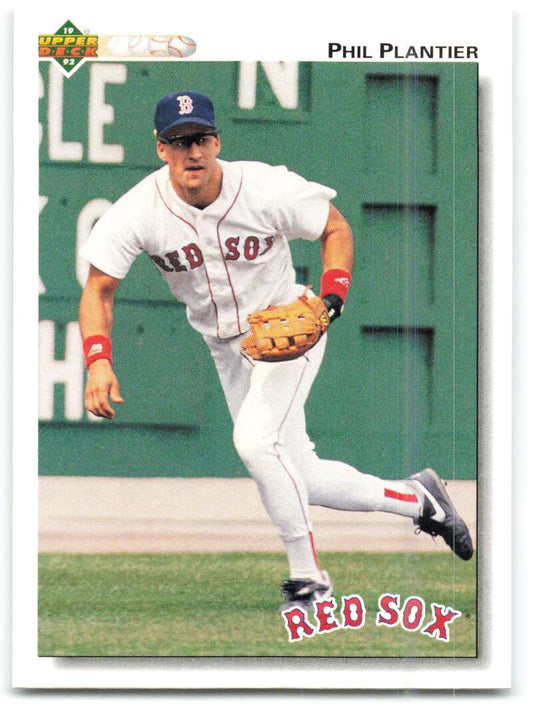 Phil Plantier in a white Boston Red Sox uniform fielding for Upper Deck card