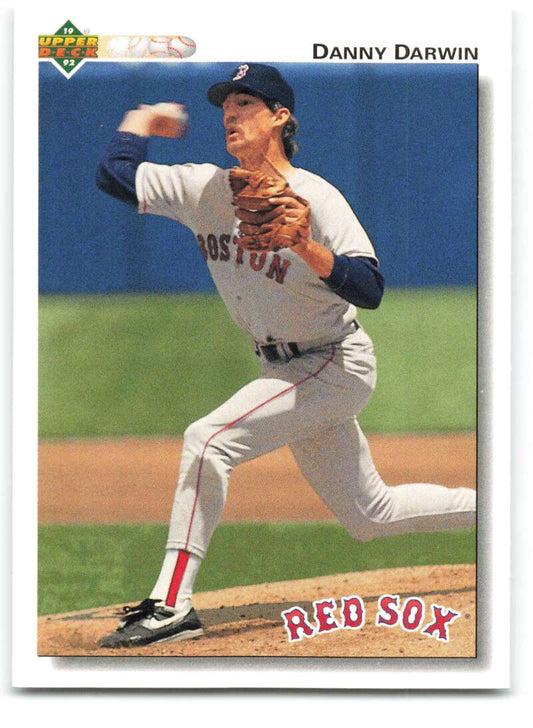 Boston Red Sox player Danny Darwin mid-pitch on the mound in action