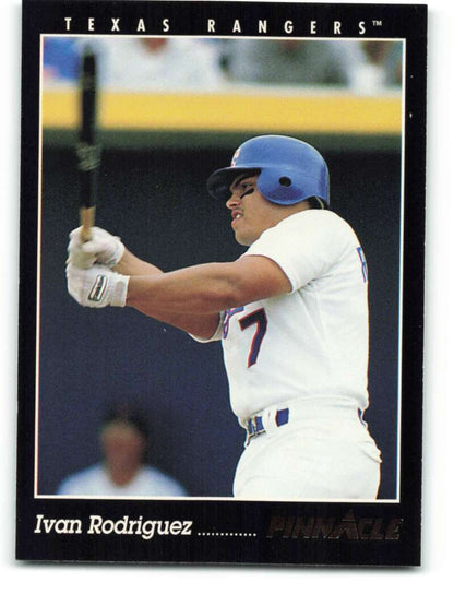 Ivan Rodriguez in Texas Rangers uniform holding bat at plate on baseball card