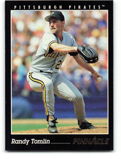 Randy Tomlin in mid-pitching motion for Pittsburgh Pirates on a baseball card