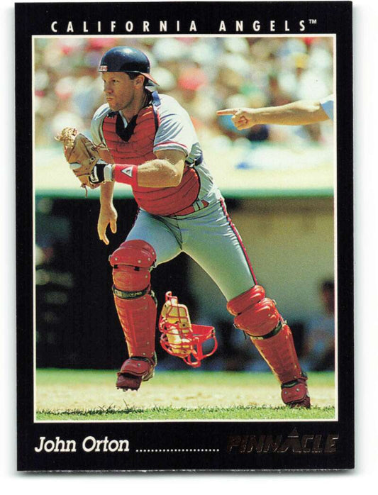 Baseball catcher John Orton in red gear ready for action on California Angels card