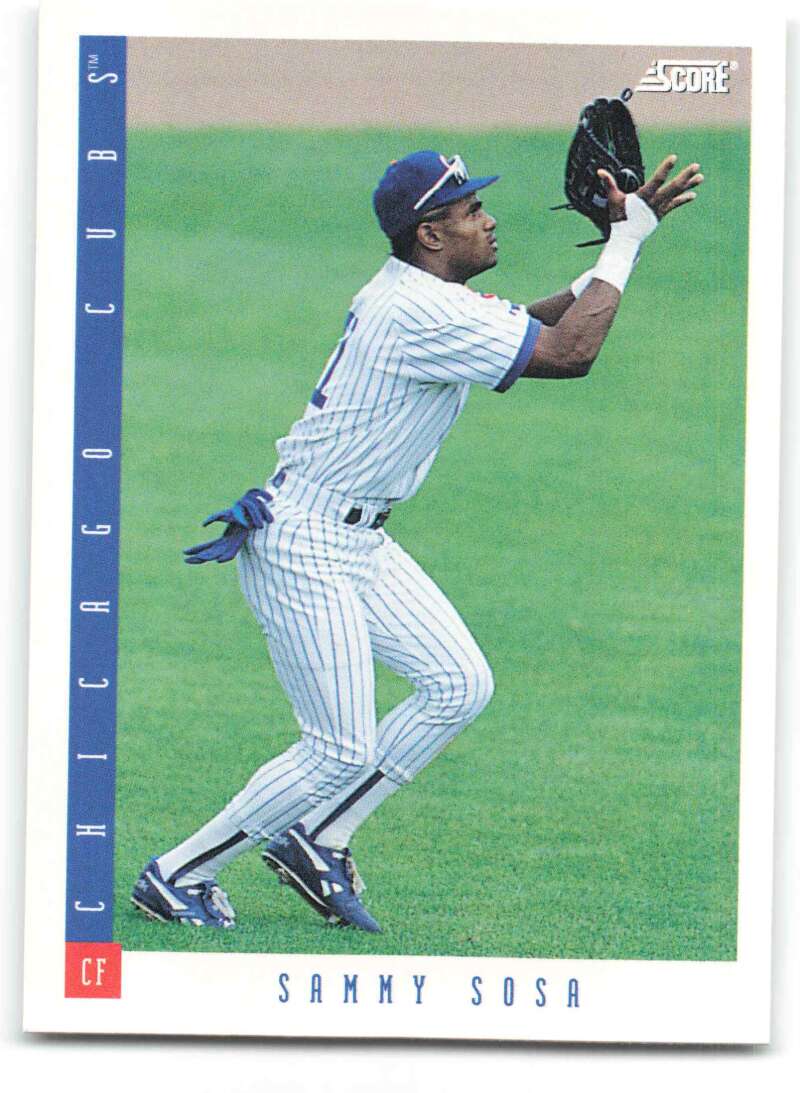 Baseball player in Chicago Cubs pinstripe uniform catching a ball, Sammy Sosa Baseball Card