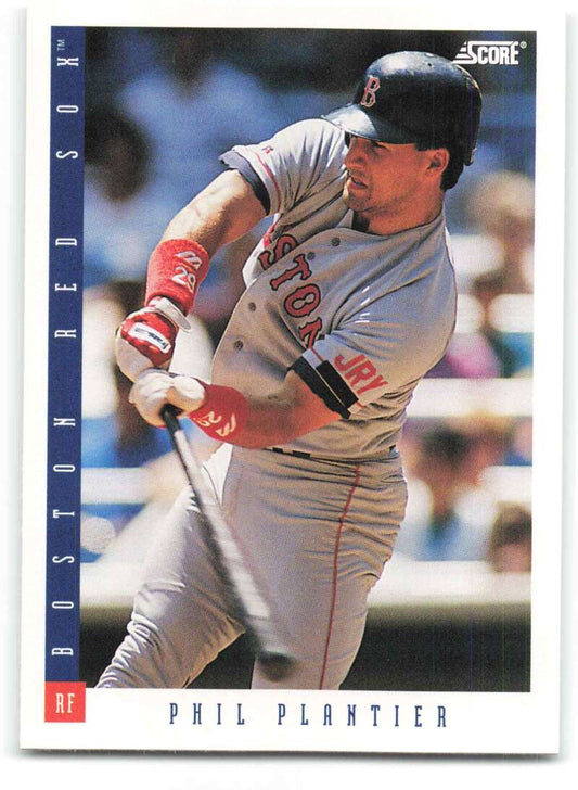 Baseball card of Phil Plantier swinging in gray Red Sox uniform