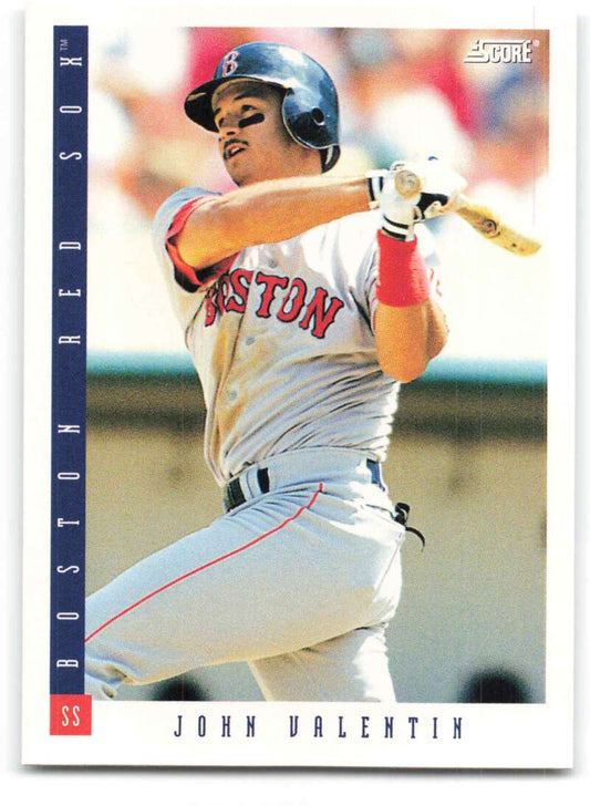 Boston Red Sox John Valentin baseball card in white uniform mid-swing