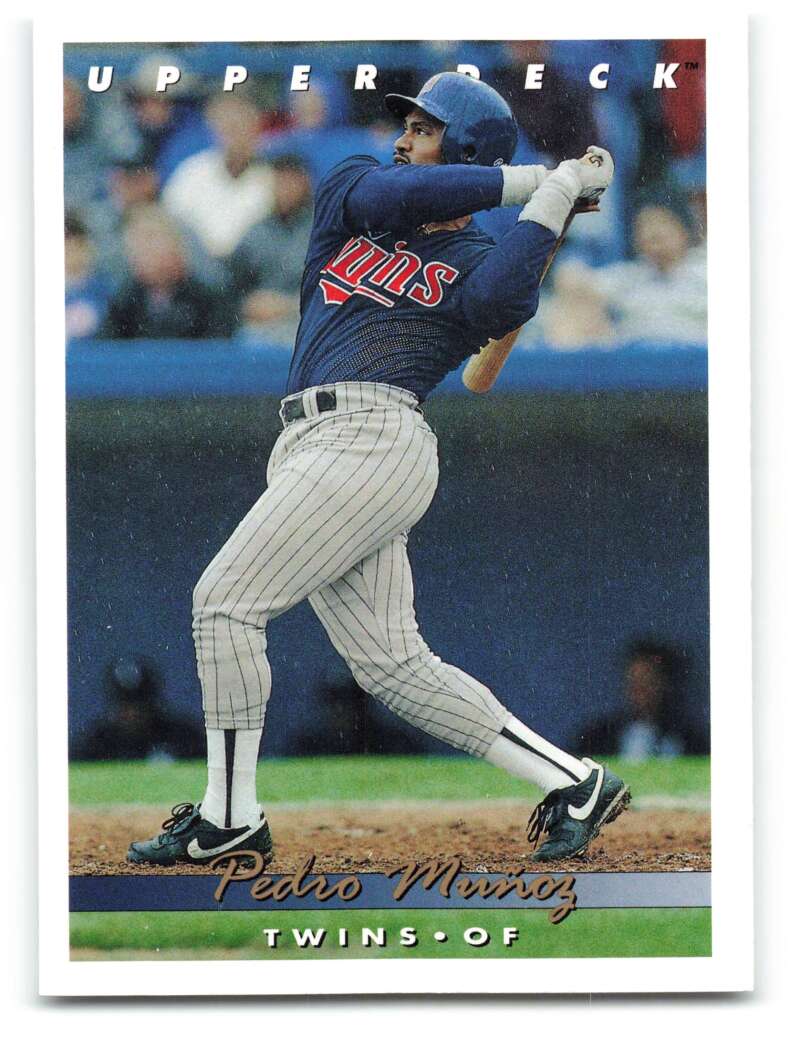 Baseball card of Pedro Munoz swinging in Minnesota Twins pinstriped uniform, Upper Deck