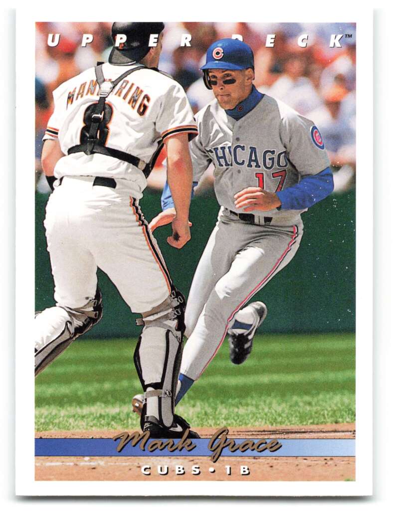 Baserunner in Chicago Cubs uniform chased by catcher in action, featured in Upper Deck Mark Grace baseball card