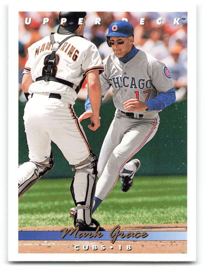 Baserunner in Chicago Cubs uniform chased by catcher in action, featured in Upper Deck Mark Grace baseball card