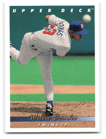 Baseball player in white pinstriped uniform pitching on 1993 Upper Deck Willie Banks card