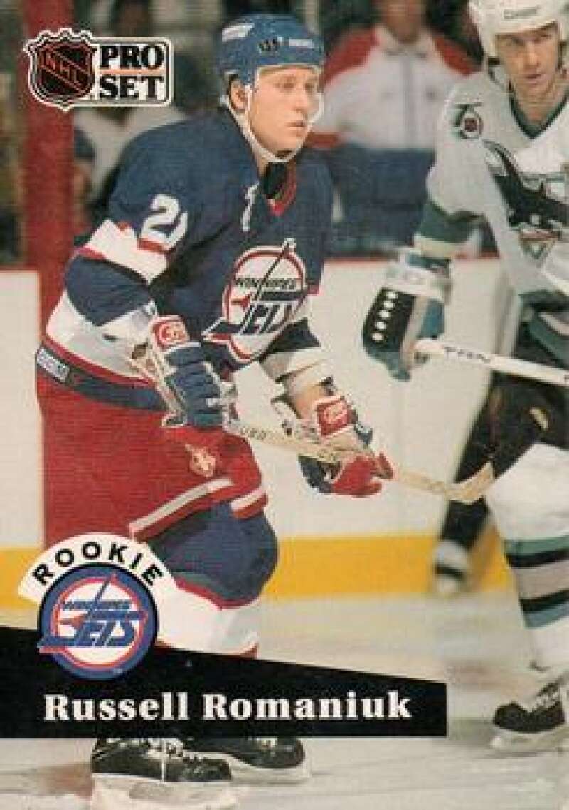 1991-92 Pro Set #565 Russ Romaniuk NM-MT RC Rookie Winnipeg Jets Hockey Card Image 1