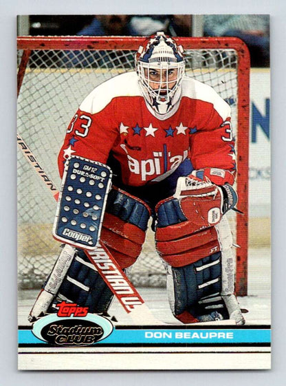 Hockey goalie Don Beaupre in red Washington Capitals jersey ready for play on card