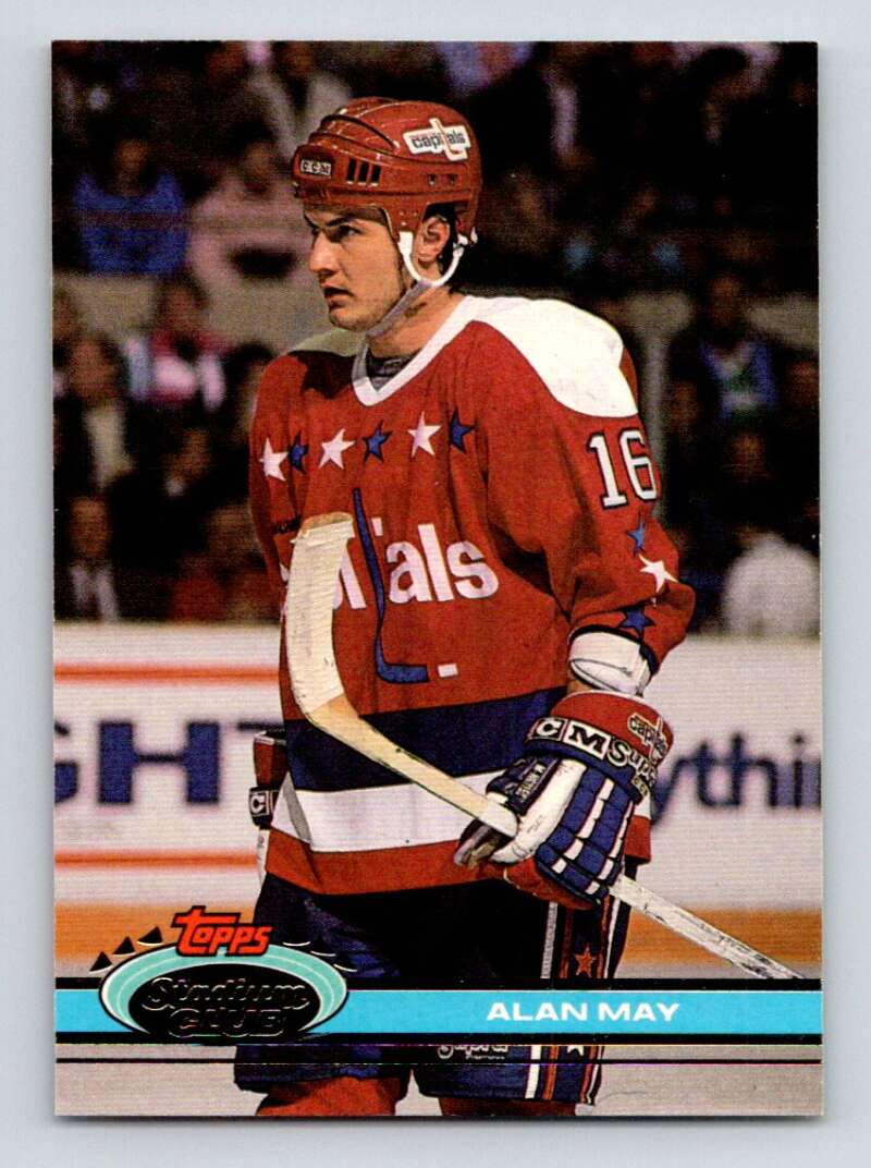 Hockey player in red Washington Capitals jersey number 16 on Topps Stadium Club card