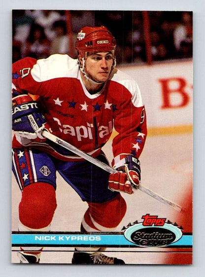 Nick Kypreos in red, white, and blue Washington Capitals uniform on hockey card