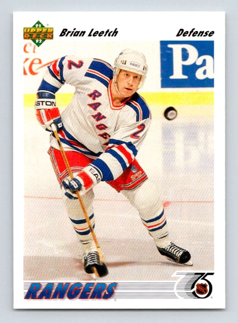 Brian Leetch skating in a white New York Rangers jersey on ice for a hockey card