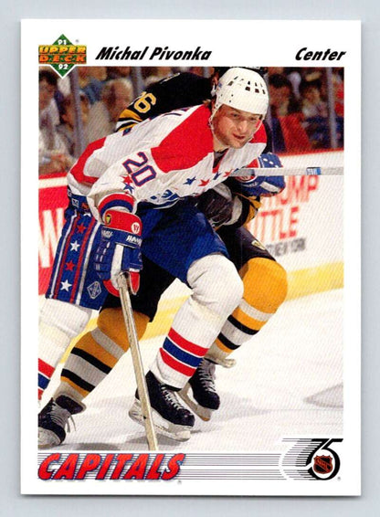 Hockey player in Montreal Canadiens jersey battles opponent, showcasing Upper Deck action