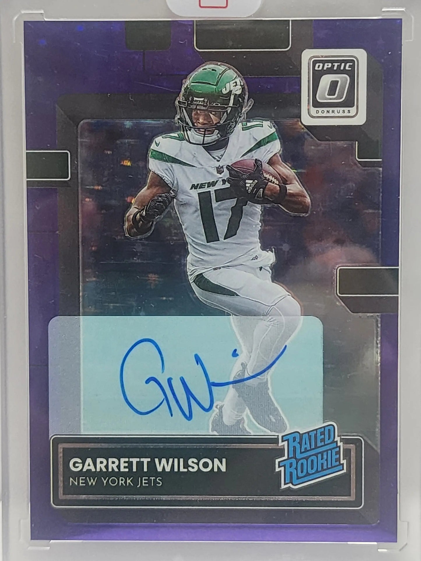 Signed Garrett Wilson Panini Optic Purple Stars Auto football card running with ball