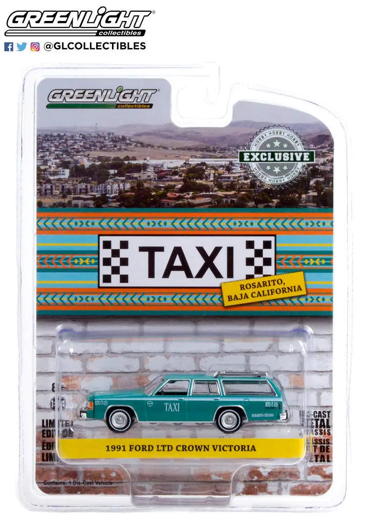 Die-cast model of a green 1983 Ford LTD Crown Victoria taxi wagon from Greenlight