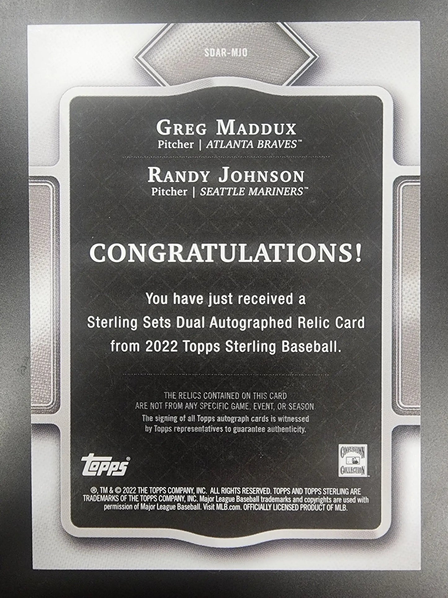 Topps Sterling Quad Relic Auto card featuring Greg Maddux Randy Johnson dual autograph