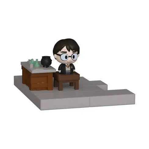 Cartoon-style student wizard figurine at desk with cauldron from Funko Mini Moments