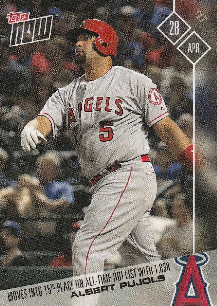 Albert Pujols swinging bat in Angels uniform for 15th place on the RBI list